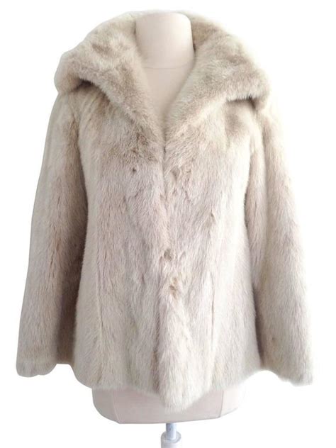 white gucci fur coat